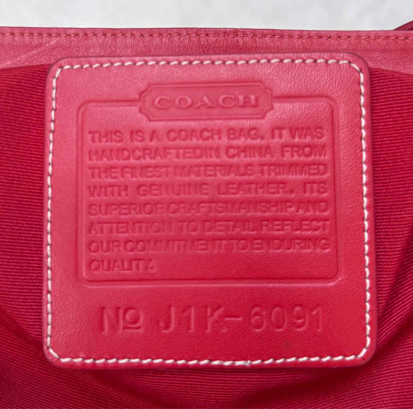 VINTAGE RED MONOGRAM HANDBAG